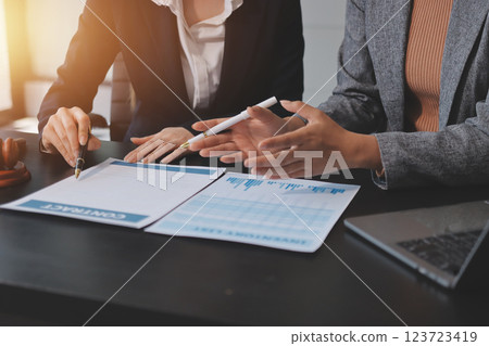 Judge gavel with Justice lawyers having team meeting at law firm background. Concepts of Law and Legal services. 123723419