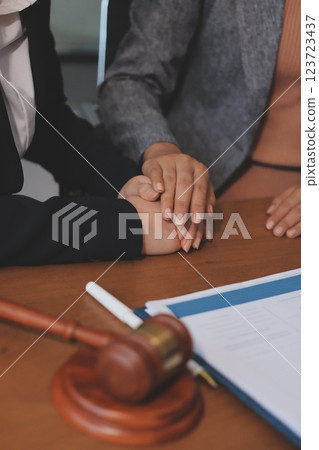 Judge gavel with Justice lawyers having team meeting at law firm background. Concepts of Law and Legal services. Judge gavel with Justice lawyers having team meeting at law firm background. Concepts of Law and Legal services. 123723437