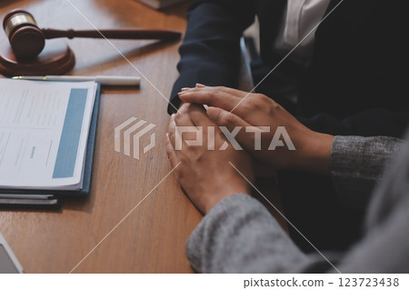 Judge gavel with Justice lawyers having team meeting at law firm background. Concepts of Law and Legal services. Judge gavel with Justice lawyers having team meeting at law firm background. Concepts of Law and Legal services. 123723438
