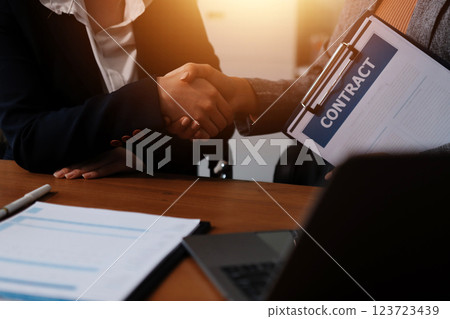 Judge gavel with Justice lawyers having team meeting at law firm background. Concepts of Law and Legal services. Judge gavel with Justice lawyers having team meeting at law firm background. Concepts of Law and Legal services. 123723439