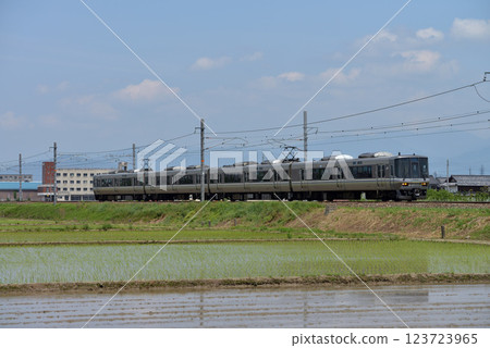 Four 223 series express trains running on the Hokuriku Main Line 123723965