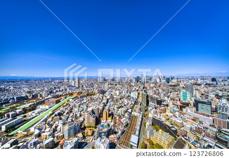 Tokyo cityscape in Japan. A rare and new view of Mt. Fuji. Views of Shibuya's buildings and trains. Akshu, Mt. Nantai Tokyo cityscape in Japan. A rare and new view of Mt. Fuji. Views of Shibuya's buildings and trains. Akshu, Mt. Nantai 123726806