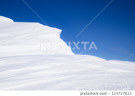 Snow-covered Mt. Tanigawa: Huge snow cornice on the ridge (avalanche danger) Snow-covered Mt. Tanigawa: Huge snow cornice on the ridge (avalanche danger) 123727611