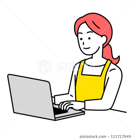 A woman in an apron operating a laptop 123727649