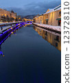 Illuminations reflected on the canal 123728110