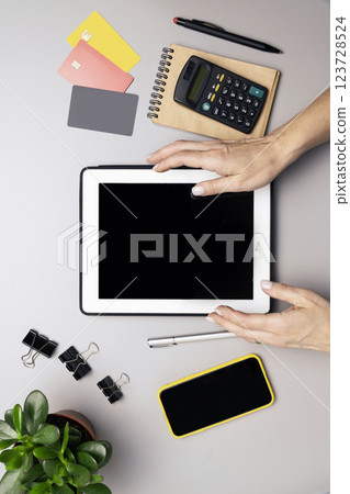 Stressed woman calculating monthly home expenses 123728524