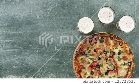 Delicious italian pizza with beer Delicious italian pizza with beer 123728525