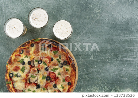 Delicious italian pizza with beer 123728526