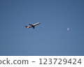 Airplane flying blue sky 123729424