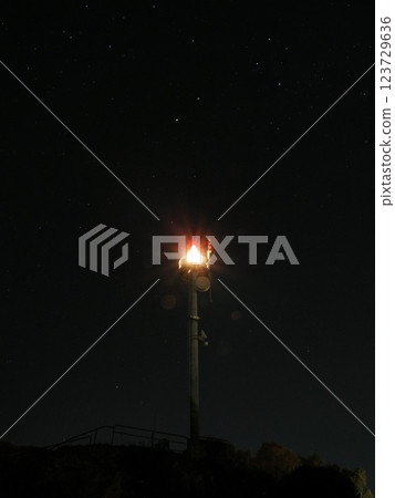 Lighthouse towering over Mount Ainslie Lookout, Canberra, Australia 123729636