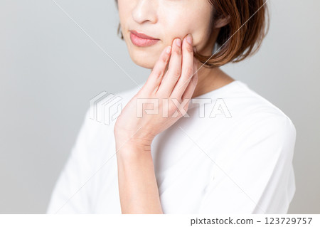 Middle-aged woman worried about skin care 123729757