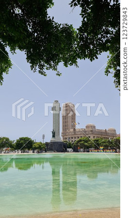 SANTA CRUZ DE TENERIFE, TENERIFE, SPAIN - July 3, 2024: View to Spain square with surrounding buildings and fountain 123729843