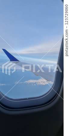 View to the wing of the plane View to the wing of the plane 123729860