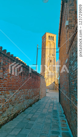 Venice street with brick walls Venice street with brick walls 123729909