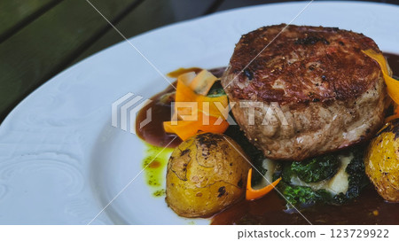 Grilled meat with potatoes and carrot Grilled meat with potatoes and carrot 123729922
