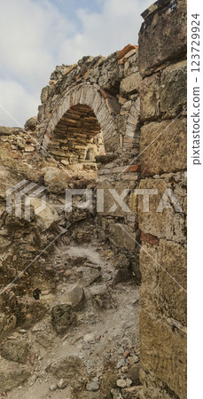Old ruins with arc vertical photography Old ruins with arc vertical photography 123729924