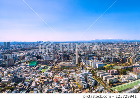 Tokyo cityscape in Japan on March 7th... View of the tower apartment complex in front of Musashi-Kosugi Station and Futako Tamagawa. Yokohama is in the background on the left = Reiwa 7 123729941