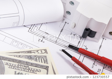 Electrical components using in electric installations, diagrams, work tools and dollar banknotes. 123730557