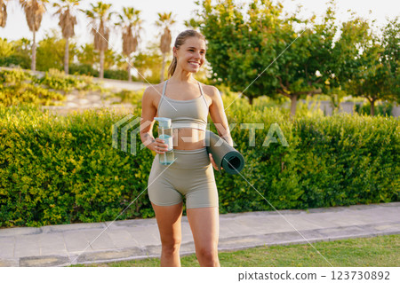 Fitness Enthusiast Relishing an Energizing Outdoor Workout Experience in Nature Today Fitness Enthusiast Relishing an Energizing Outdoor Workout Experience in Nature Today 123730892