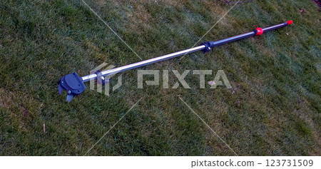 Garden pruning shears lying on grass. Close-up 123731509