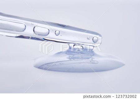 Pipette with delicate blue serum close-up. Pipette with delicate blue serum close-up. 123732002