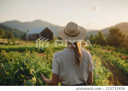 Organic Farmer Feeding Free Range Chickens at Sunset 123732456