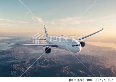 Cargo Plane Soaring Above the Horizon at Sunset 123732497