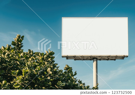 Empty Billboard in Urban Setting Against Blue Sky 123732500