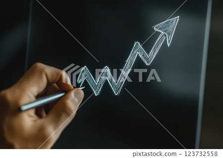 Dramatic Close-Up of Hand Drawing Rising Arrow on Dark Background for Business Concept 123732558