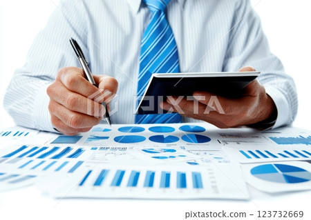 Professional Financial Consultant Analyzing Comprehensive Data Report with Graphs and Charts for Strategic Decision-Making in a Modern Office Environment Professional Financial Consultant Analyzing Comprehensive Data Report with Graphs and Charts for Strategic Decision-Making in a Modern Office Environment 123732669