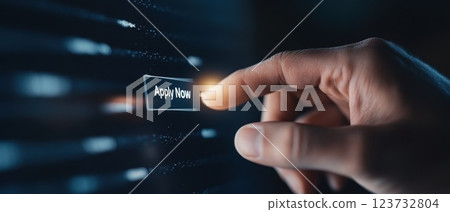 Hand Clicking Apply Now Button on Screen 123732804