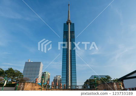 Fukuoka observation tower by Momochi Seaside Park in spring, Japan 123733189
