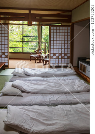 Japanese tatami bedroom in ryokan, Yanagawa, Fukuoka Japanese tatami bedroom in ryokan, Yanagawa, Fukuoka 123733202