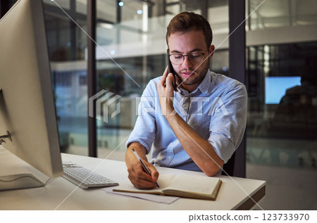 Businessman, phone call at night and writing in notebook for planning, schedule or agenda for business meeting in office. Corporate worker in Australia working with mobile smartphone, pc and notes Businessman, phone call at night and writing in notebook for planning, schedule or agenda for business meeting in office. Corporate worker in Australia working with mobile smartphone, pc and notes 123733970