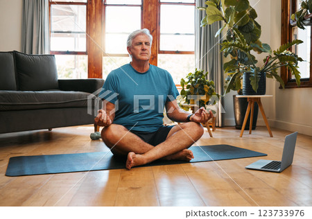 Yoga, online and meditation with a senior man following a zen fitness class for workout, exercise and training. Laptop, health and retirement with an elderly male pensioner exercising in his home 123733976