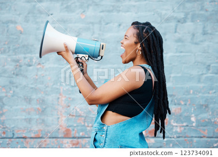 Megaphone voice, black woman and attention for speech, protest and loud communication. Freedom rally, noise and warning announcement fight for gender equality, politics and human rights revolution Megaphone voice, black woman and attention for speech, protest and loud communication. Freedom rally, noise and warning announcement fight for gender equality, politics and human rights revolution 123734091