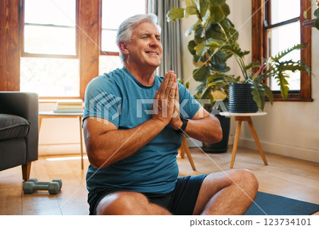 Home meditation, zen and senior man work on inner spiritual peace, freedom of the mind and wellness lifestyle. Namaste, yoga and pilates training person meditating, doing breathing exercise and relax 123734101