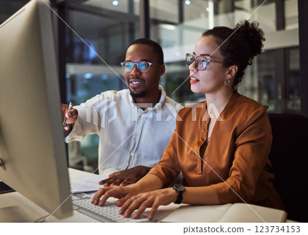 Night training, teamwork and employees planning marketing strategy in a dark office on computer at work. Corporate African man and woman talking about business collaboration during overtime together 123734153