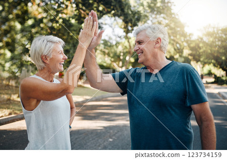 High five, success or senior couple fitness in running workout, exercise or training in nature park or Canada garden. Smile, happy or sports teamwork gesture for retirement man and woman health goals 123734159