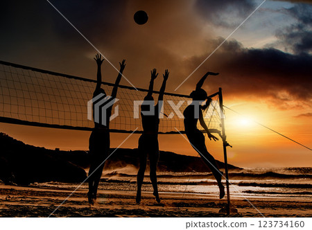 Sports, beach and volleyball at sunset by women silhouette jumping for ball together, fun, travel and summer. Energy, fitness and exercise with sports friends playing beach volleyball game in Brazil Sports, beach and volleyball at sunset by women silhouette jumping for ball together, fun, travel and summer. Energy, fitness and exercise with sports friends playing beach volleyball game in Brazil 123734160