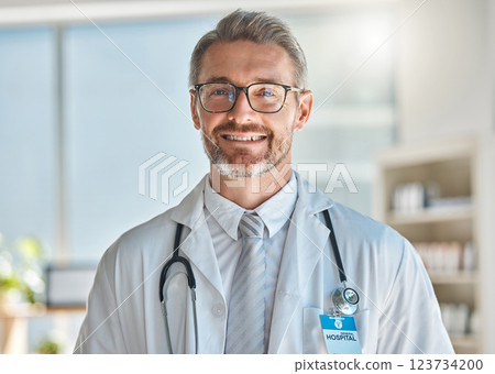 Doctor, smile and office working at hospital, clinic or medical facility. Medic, man and happy at work with stethoscope, glasses and happiness on face in portrait at healthcare center in Atlanta Doctor, smile and office working at hospital, clinic or medical facility. Medic, man and happy at work with stethoscope, glasses and happiness on face in portrait at healthcare center in Atlanta 123734200