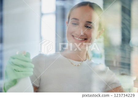 Smile, home and woman cleaning window, housework or washing shower cabin. Hygiene, glass and happy female from Canada in rubber gloves, scrub and spring cleaning, sanitize for germ free living space. 123734229
