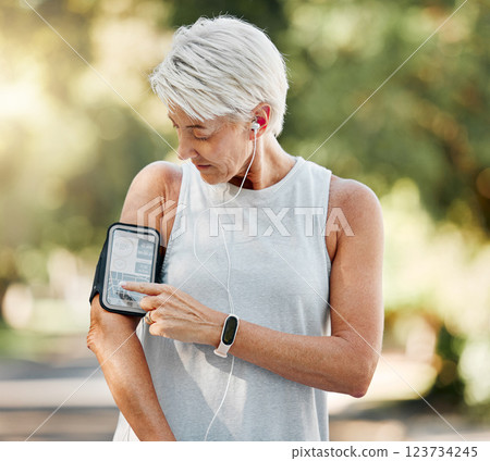 Senior woman with phone running app for steps, fitness and training exercise tracking while on run, walk or cardio workout. Retirement lifestyle, runner and elderly wellness person with health goal Senior woman with phone running app for steps, fitness and training exercise tracking while on run, walk or cardio workout. Retirement lifestyle, runner and elderly wellness person with health goal 123734245