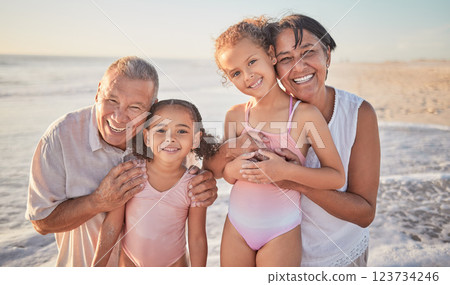 Family, children and beach with a girl, grandparents and sister on the sand by the ocean or sea at sunset. Kids, summer and travel with a grandfather, grandmother and grandchildren on holiday Family, children and beach with a girl, grandparents and sister on the sand by the ocean or sea at sunset. Kids, summer and travel with a grandfather, grandmother and grandchildren on holiday 123734246