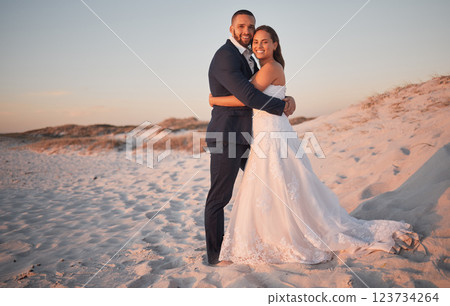 Wedding, couple and bride with groom at a beach in Cancun, Mexico in celebration of love, trust and marriage. Smile, romance and happy woman hugging her partner enjoying a special day and commitment 123734264