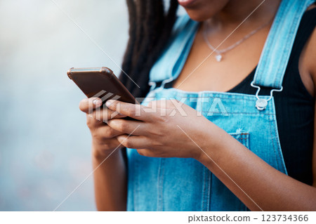 Gen z black woman hands, social media and city phone typing, contact and communication on smartphone internet technology in Jamaica city. Closeup urban girl mobile apps, connect to 5g website online Gen z black woman hands, social media and city phone typing, contact and communication on smartphone internet technology in Jamaica city. Closeup urban girl mobile apps, connect to 5g website online 123734366