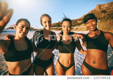 Active, selfie and team of women at beach for volleyball training on Brazil vacation for sports, fitness or games at sunset. Smile, support and summer with friends in a bikini together for workout 123734418