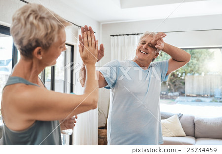 High five, fitness success and senior couple after home workout, exercise and training in house lockdown. Smile, happy or health motivation retirement elderly woman or tired woman sweating in pilates High five, fitness success and senior couple after home workout, exercise and training in house lockdown. Smile, happy or health motivation retirement elderly woman or tired woman sweating in pilates 123734459