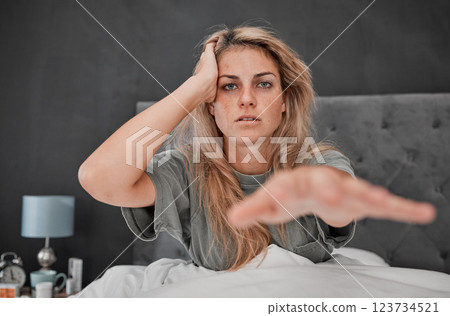 Woman, stress and insomnia in house bedroom, home or hotel with mental health, anxiety and depression. Portrait, hangover and headache for person with a sleeping problem, pills addiction and burnout Woman, stress and insomnia in house bedroom, home or hotel with mental health, anxiety and depression. Portrait, hangover and headache for person with a sleeping problem, pills addiction and burnout 123734521