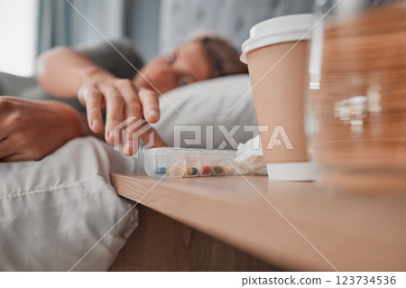 Depression pills, insomnia medicine and woman sleeping in bed for pharmaceutical, psychology or mental health awareness. Depressed, addiction and sick or sad person and drugs help or risk in bedroom 123734536